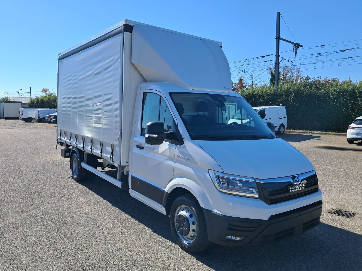 MAN TGE 5.160 CAISSE - BACHE HAYON